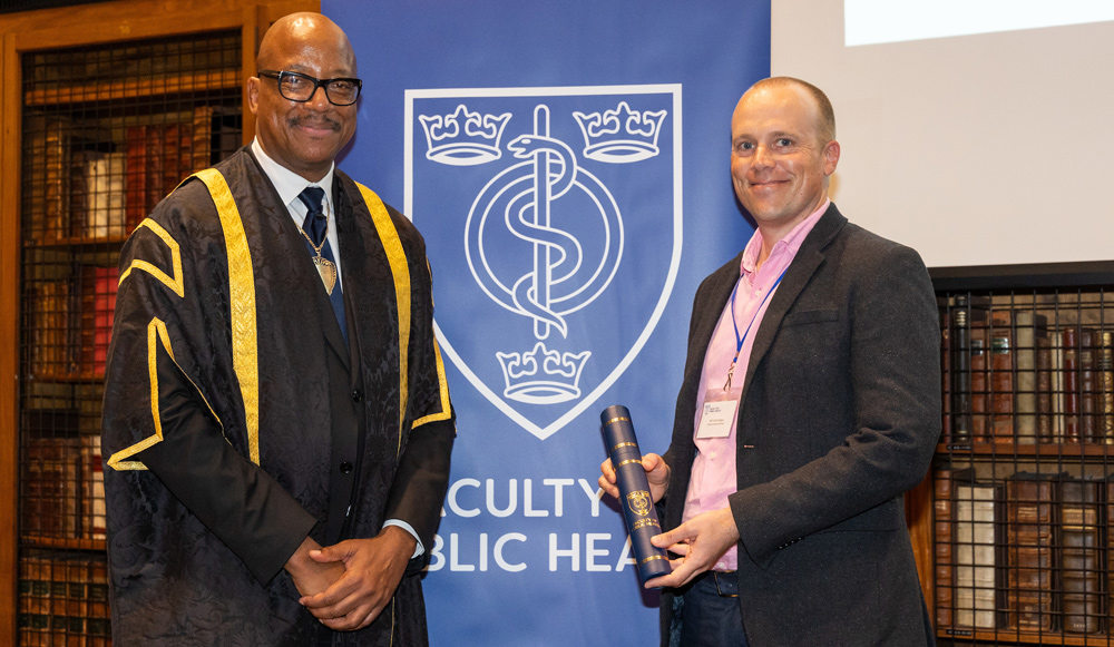 President of the Faculty of Public Health, Professor Kevin Fenton, with Colin Angus